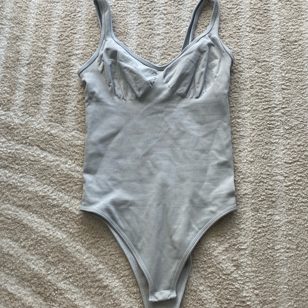 OQQ light blue bodysuit